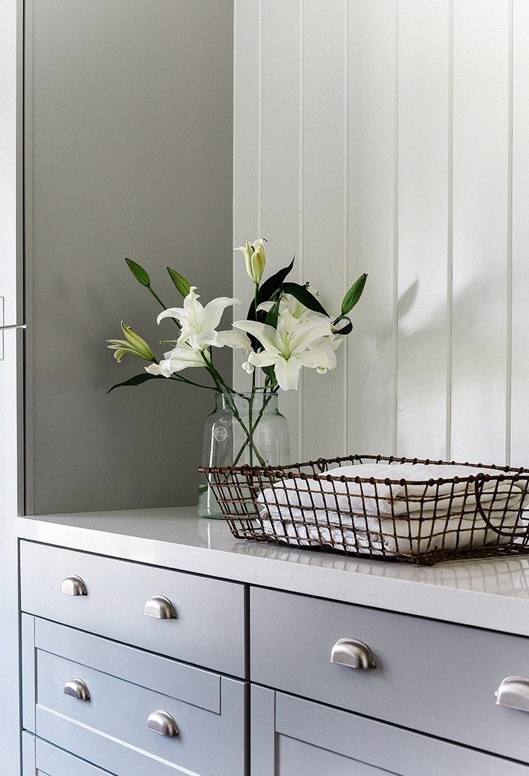 A laundry room transformation with Chloe Mackintosh from Boxwood Avenue. Read how Chloe renovated her washroom into a beautiful, functional space!