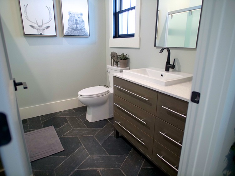 Jamison Rantz of Rogue Engineer takes on three bathroom renovations with ease thanks to Delta's customizable UPstile Wall System.