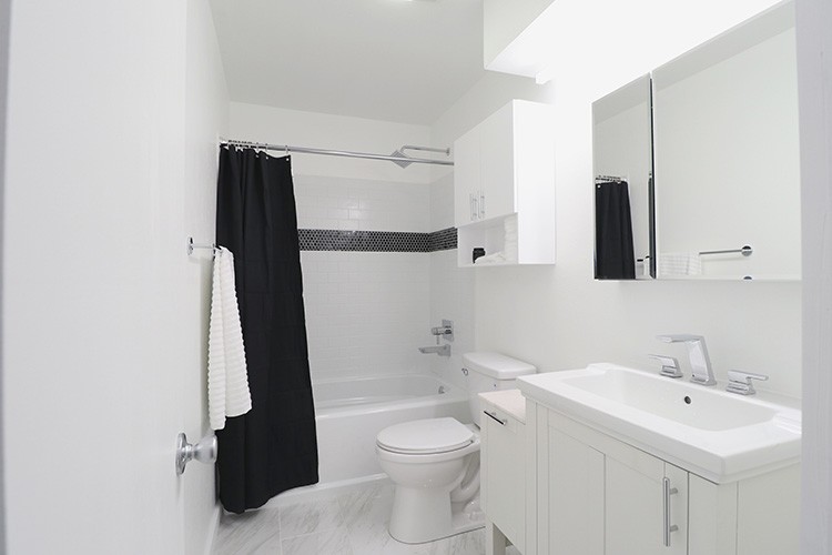 Mike Montgomery takes on a modern bathroom renovation, turning his dark and dated guest bathroom into a bright and inviting space.