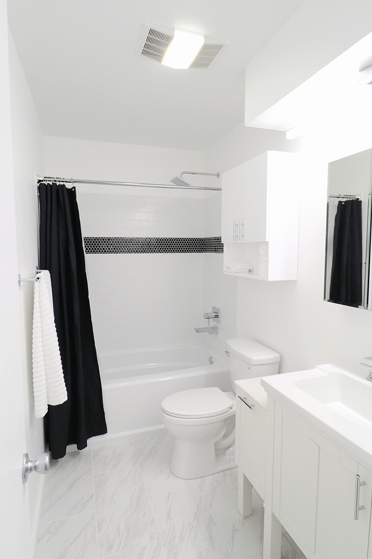 Mike Montgomery takes on a modern bathroom renovation, turning his dark and dated guest bathroom into a bright and inviting space.