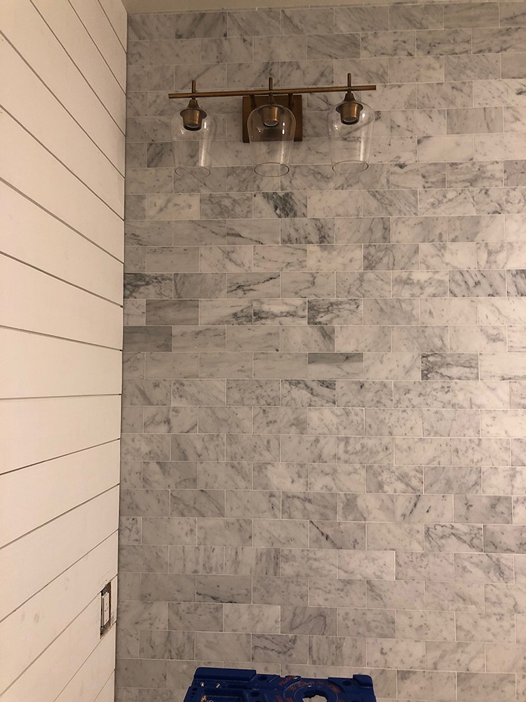 Katelyn Jones of A Touch of Pink takes on a beautiful bathroom remodel starring the Delta UPstile Wall System. Read below to see the full transformation from the demo to the final finished space.