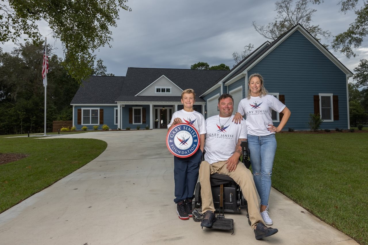 The Davis family outside of their home.