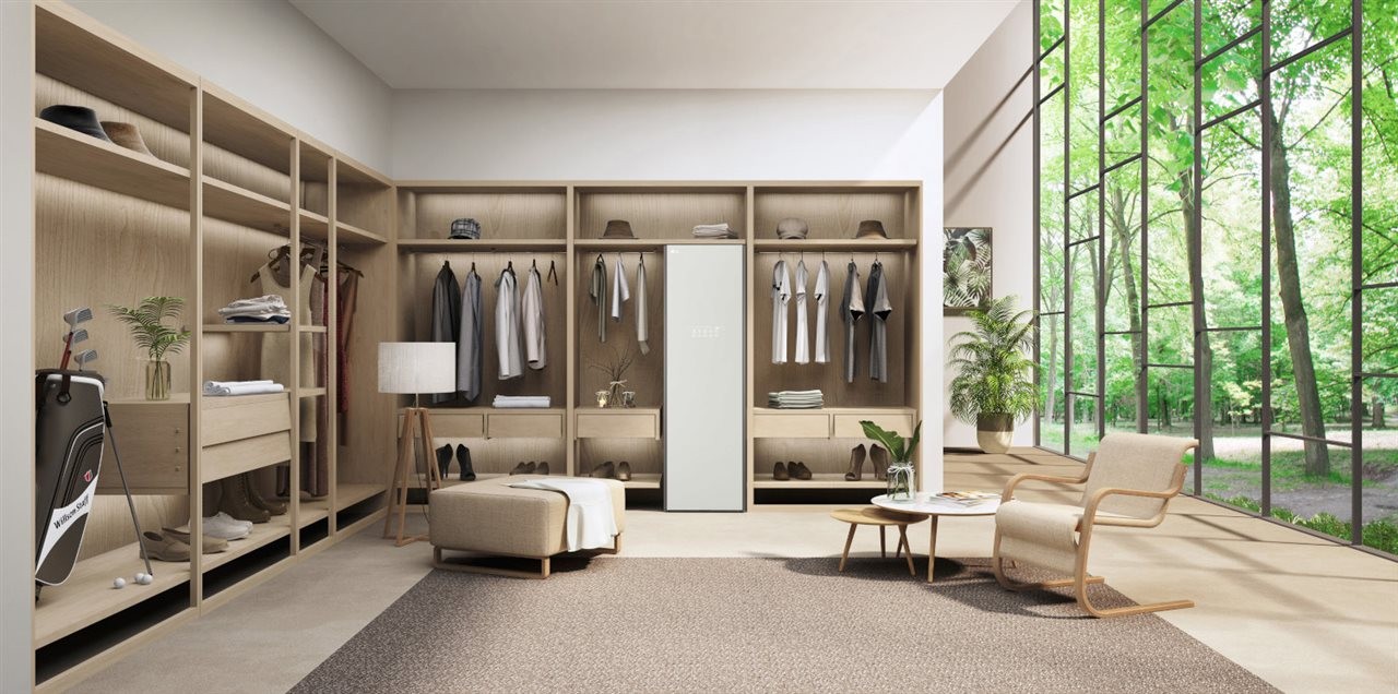 Large changing room with huge windows and an LG styler.