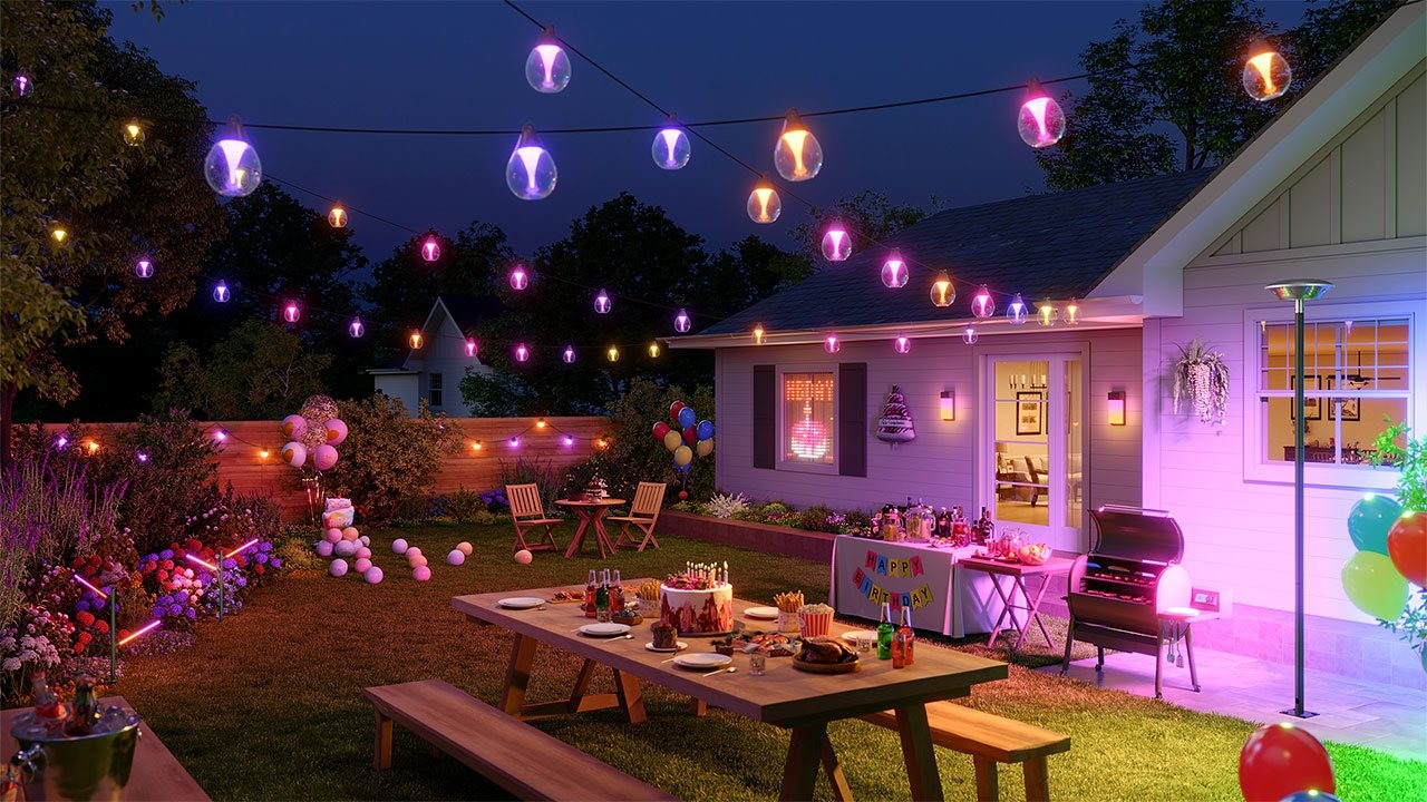 Evening birthday party in the backyard with custom lighing