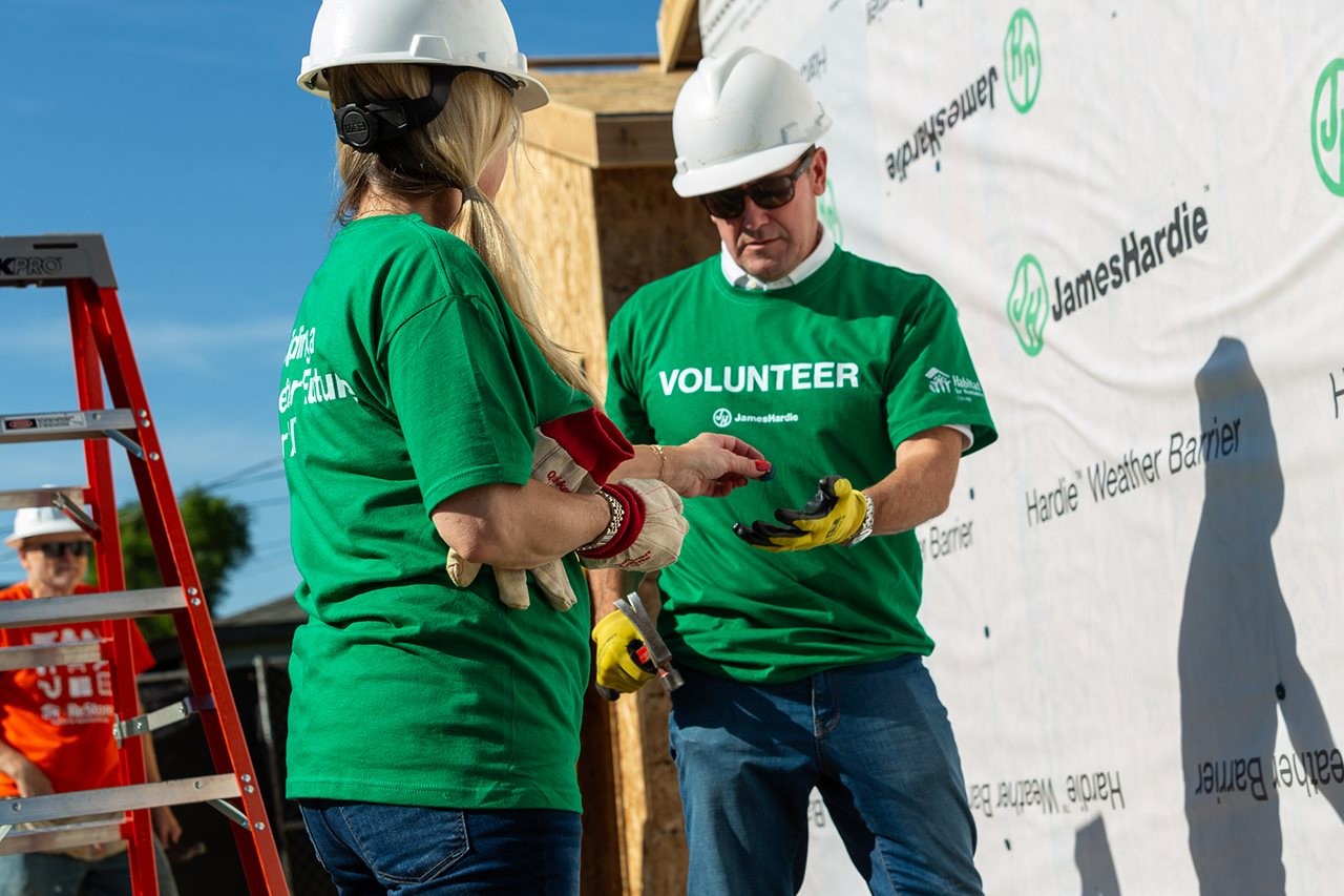 Representatives of James Hardie building a home in partnership with Habitat for Humanity