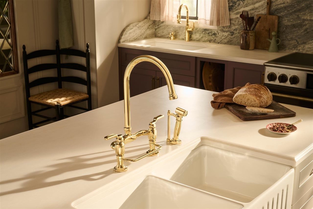 Brizo<sup><sup/>&reg;</sup> Faircroft&trade; Kitchen Collection Widespread Kitchen Faucet With Arc Spout and Side Sprayer in Unlacquered Brass” width=”600″ border=”0″></div>
<div class=